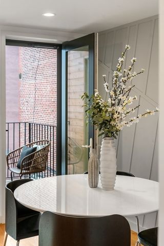 a vase of flowers sitting on a table