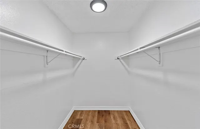 a view of room with racks on the wall