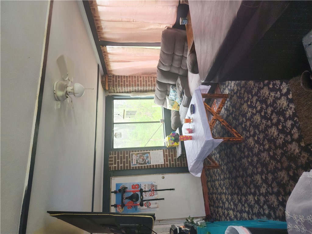 1436 Ruskin Road Dayton, OH 45406 - Photo 24 of 29 This inviting living area offers a warm and comfortable atmosphere with ample natural light.