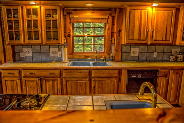 1403 Burt Hill Road Tolland, MA 01034 - Photo 3 of 30 a kitchen with a sink and a window