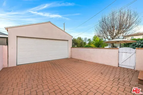 a view of backyard of house