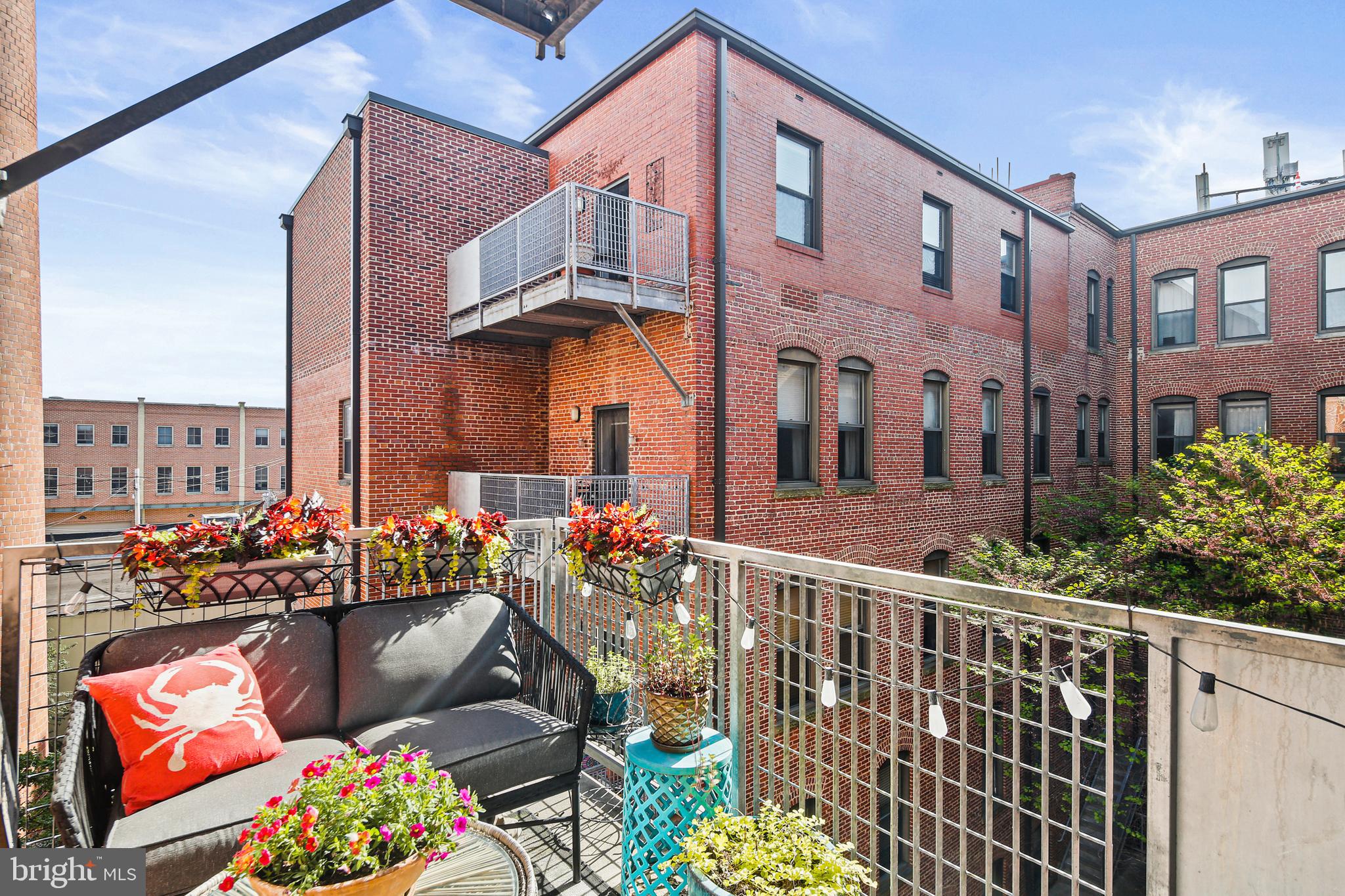 1211 Light Street, Unit 308 Baltimore, MD 21230 - Photo 16 of 29 a view of building from the balcony