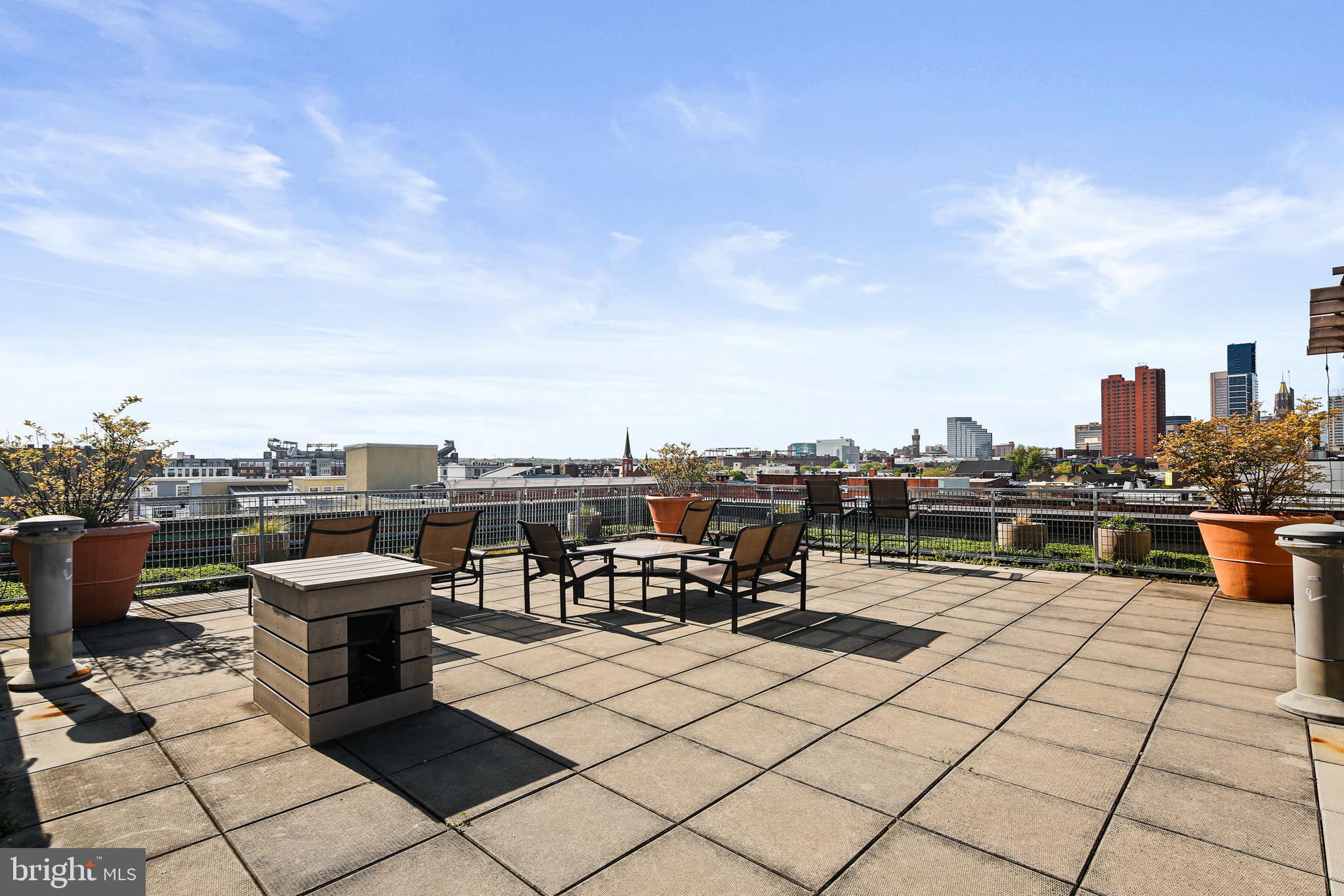 1211 Light Street, Unit 308 Baltimore, MD 21230 - Photo 20 of 29 a terrace with outdoor seating