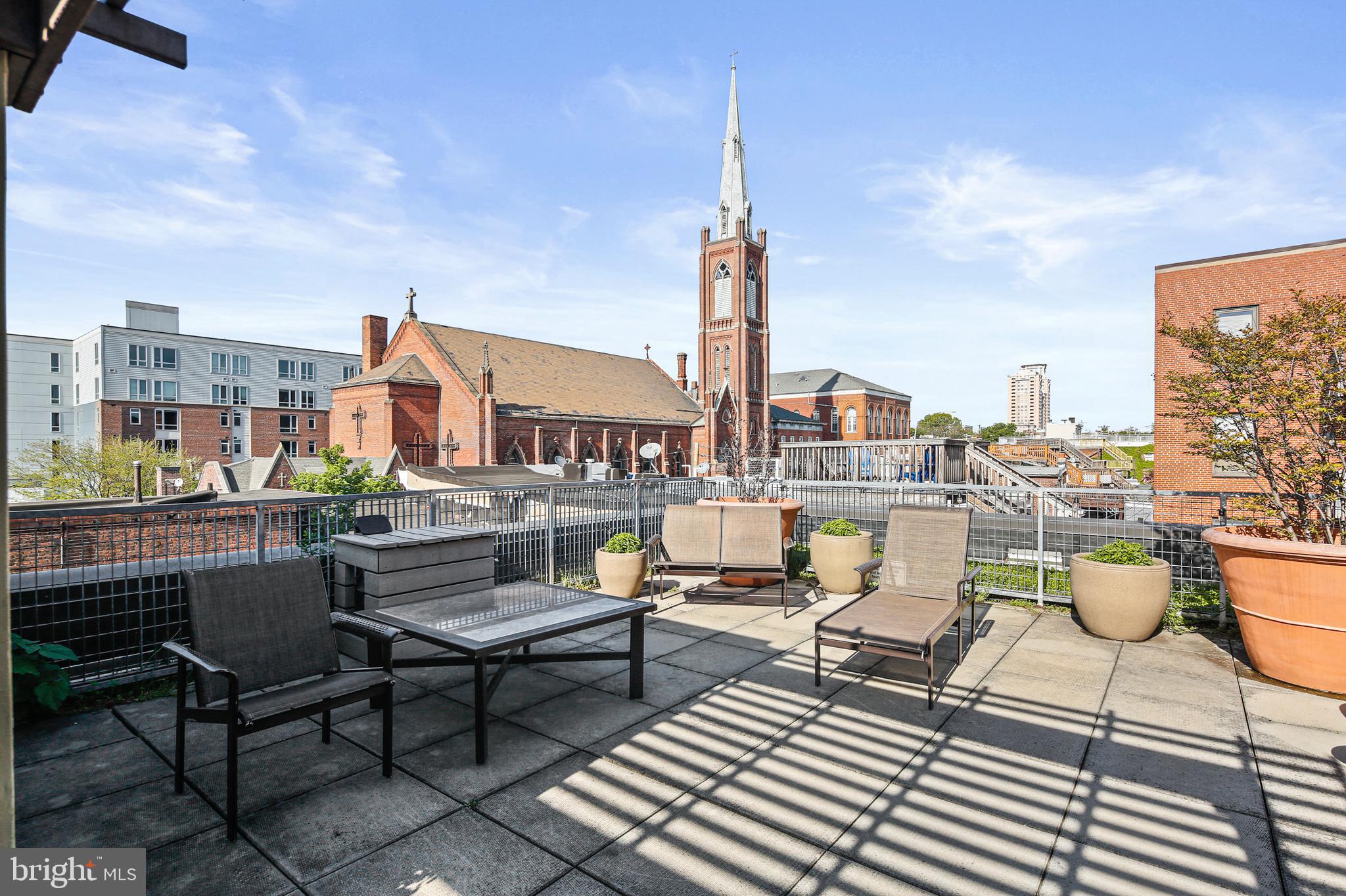 1211 Light Street, Unit 308 Baltimore, MD 21230 - Photo 23 of 29 a view of a terrace with furniture