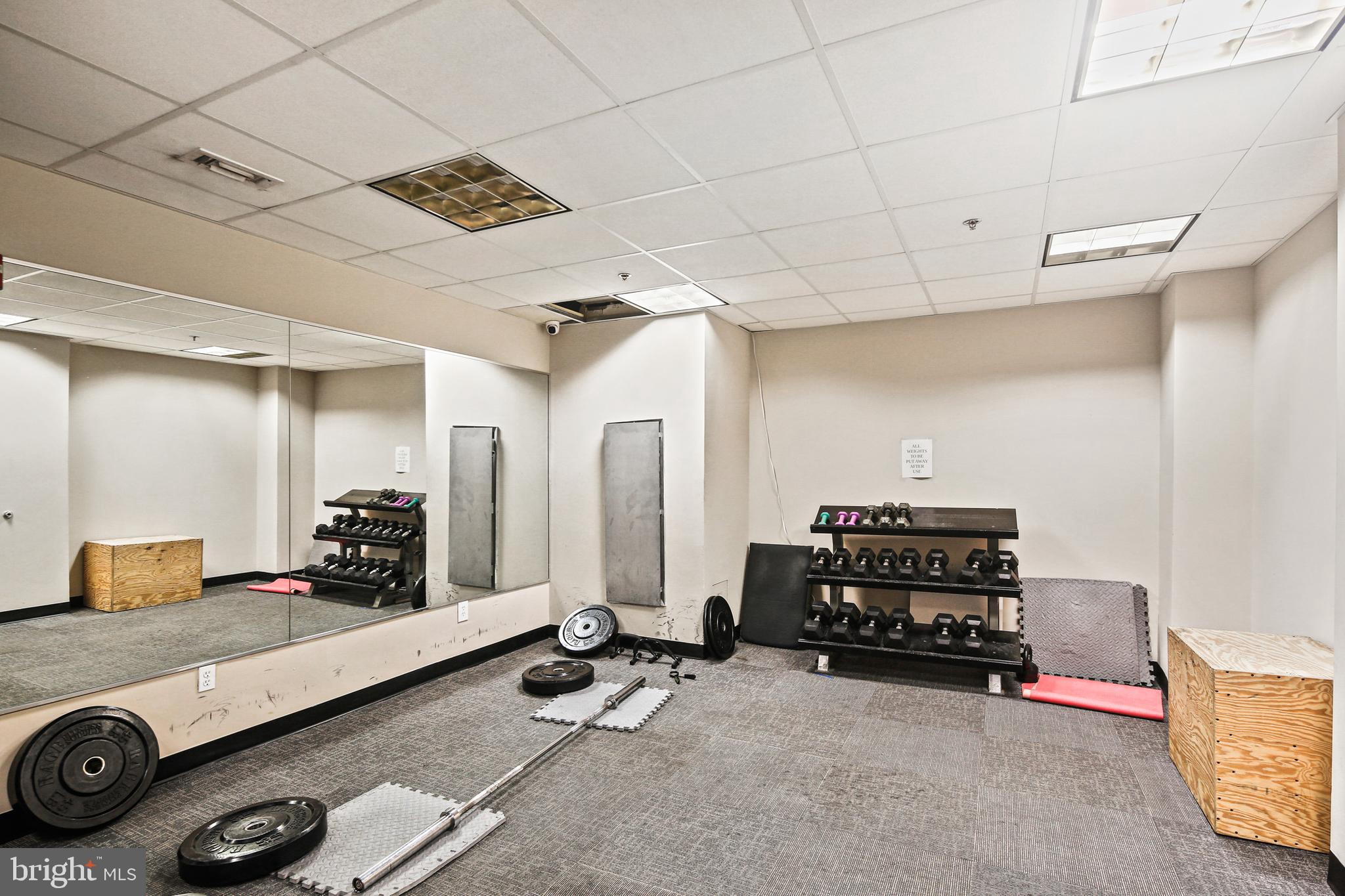 1211 Light Street, Unit 308 Baltimore, MD 21230 - Photo 24 of 29 a room with gym equipment