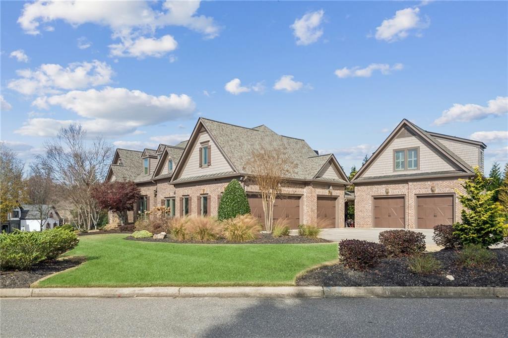 3030 Wills Mill Road Cumming, GA 30041 - Photo 12 of 71 front view of a house with a yard