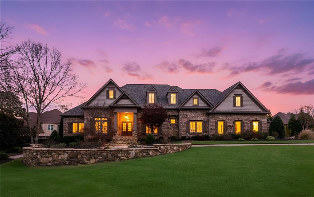 3030 Wills Mill Road Cumming, GA 30041 - Photo 15 of 71 a front view of a house with a yard