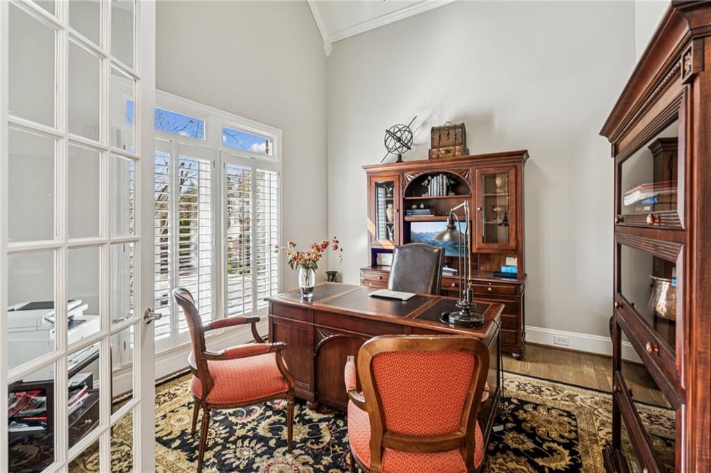 3030 Wills Mill Road Cumming, GA 30041 - Photo 19 of 71 a view of a workspace with furniture and a window