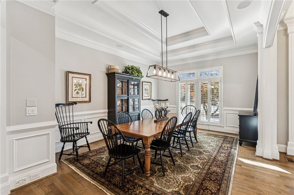 3030 Wills Mill Road Cumming, GA 30041 - Photo 20 of 71 a view of a dining room with furniture window and wooden floor