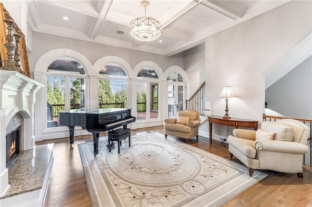 3030 Wills Mill Road Cumming, GA 30041 - Photo 21 of 71 a living room with fireplace furniture and a large window