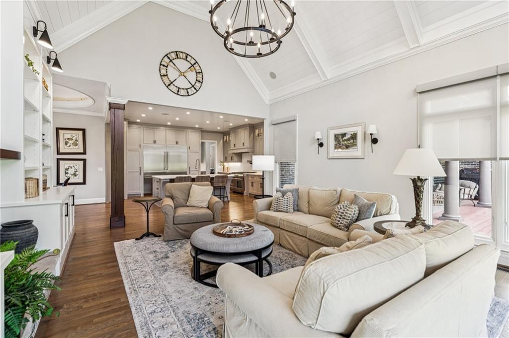 3030 Wills Mill Road Cumming, GA 30041 - Photo 29 of 71 a living room with furniture and a chandelier