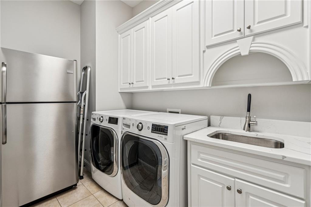 3030 Wills Mill Road Cumming, GA 30041 - Photo 41 of 71 a utility room with dryer and washer
