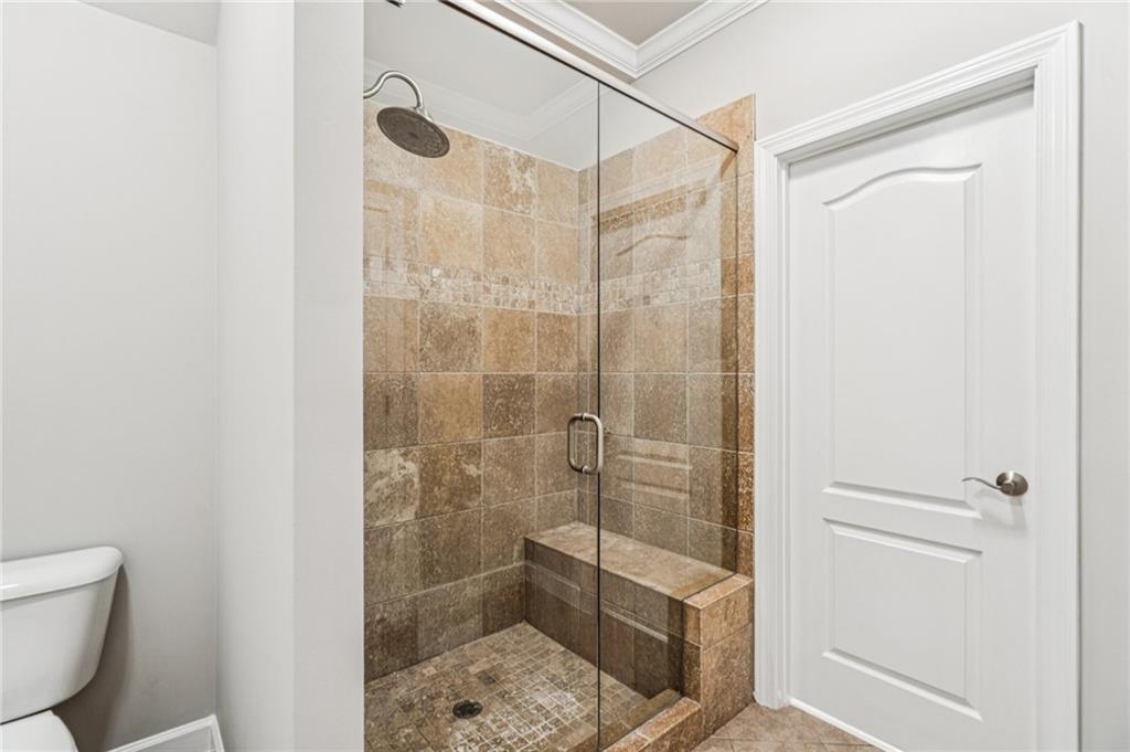 3030 Wills Mill Road Cumming, GA 30041 - Photo 47 of 71 a bathroom with a shower a toilet and sink