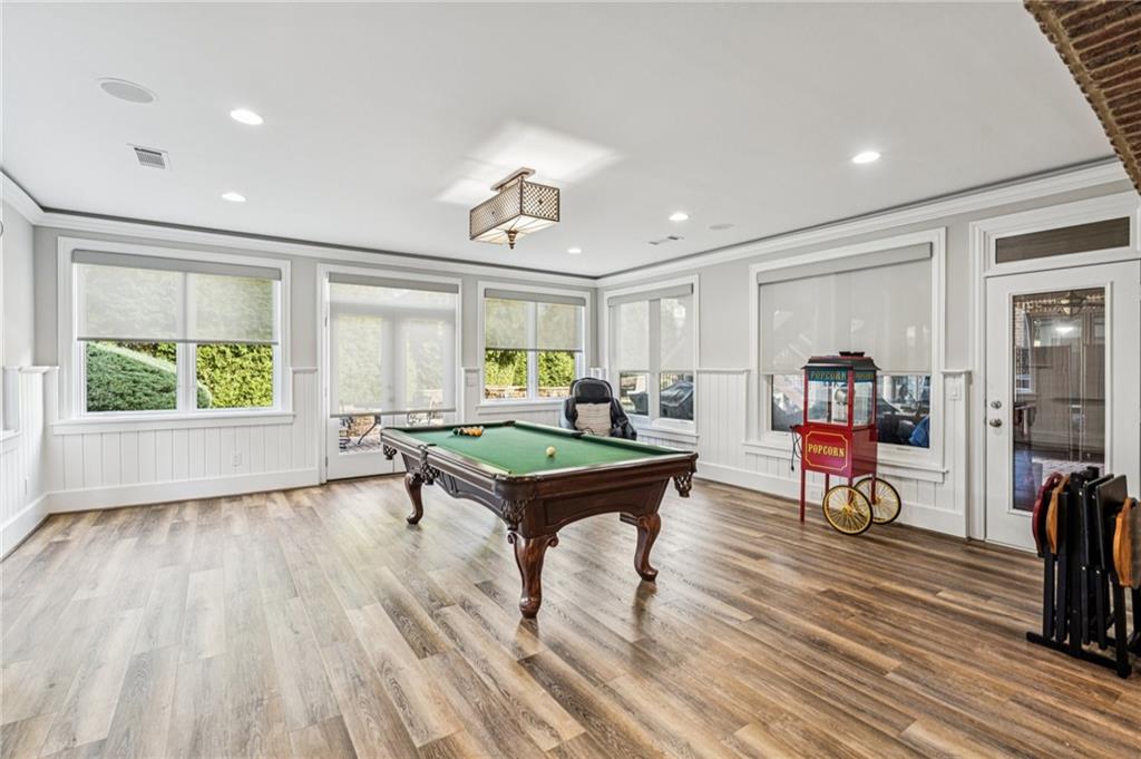 3030 Wills Mill Road Cumming, GA 30041 - Photo 52 of 71 a living room with furniture and a wooden floor