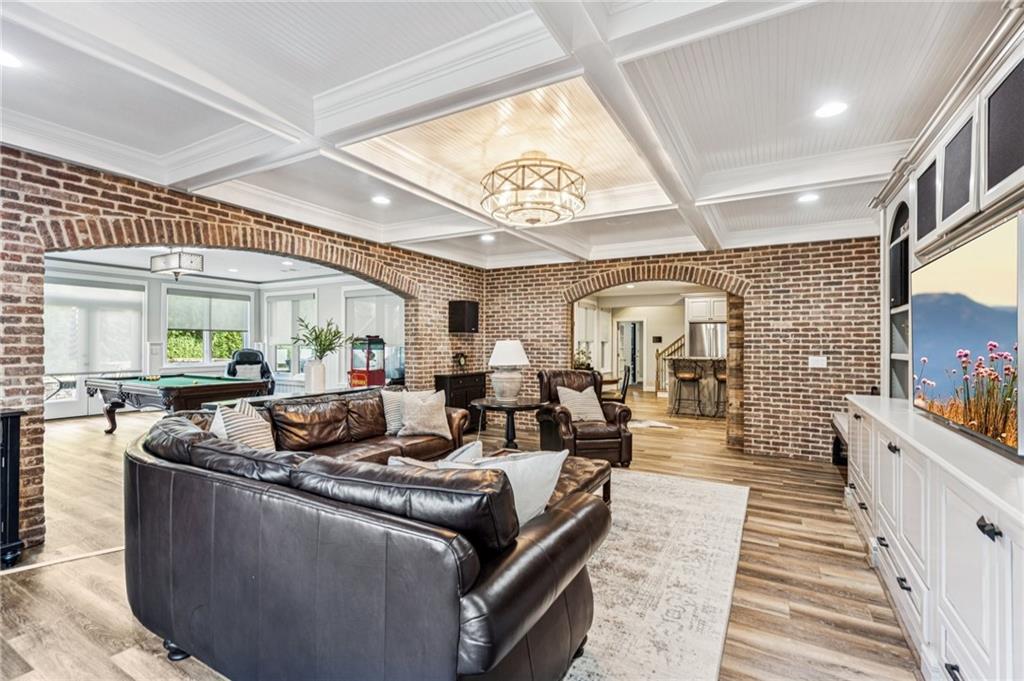 3030 Wills Mill Road Cumming, GA 30041 - Photo 7 of 71 a living room with furniture and a large window
