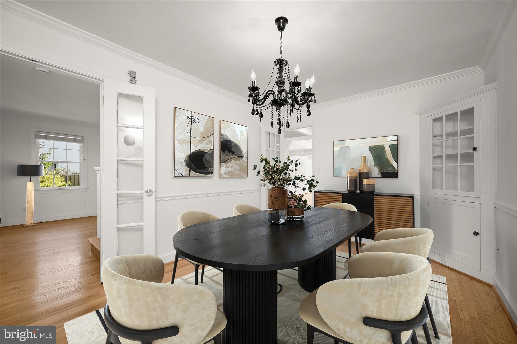 7012 Exeter Road Bethesda, MD 20814 - Photo 18 of 103 a view of a dining room with furniture and wooden floor