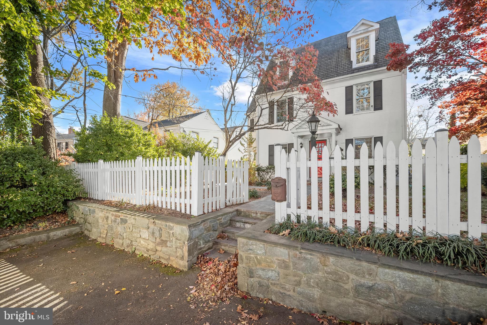 7012 Exeter Road Bethesda, MD 20814 - Photo 2 of 103 a view of a house with a small yard and wooden fence