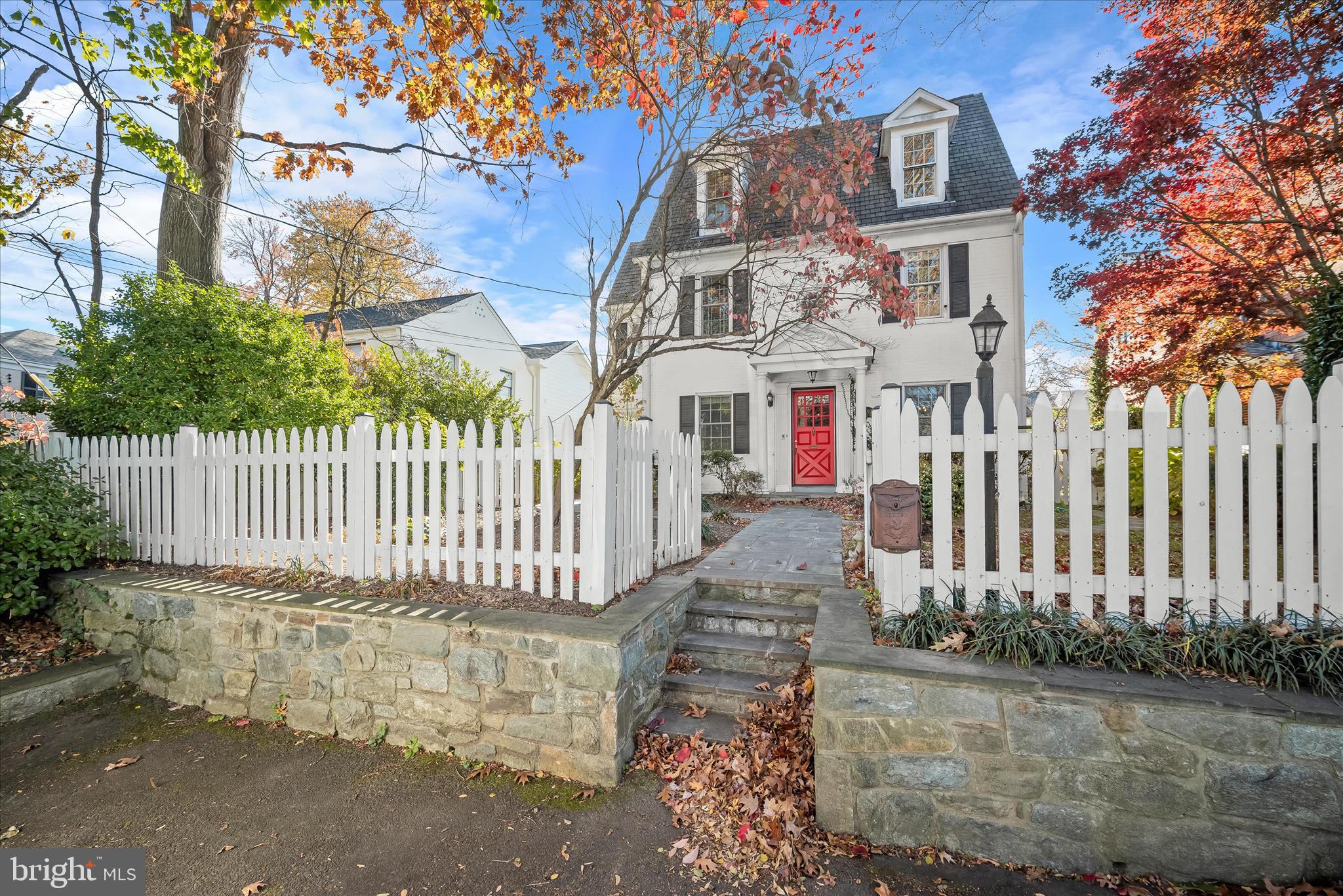 7012 Exeter Road Bethesda, MD 20814 - Photo 3 of 103 a front view of a house with a garden