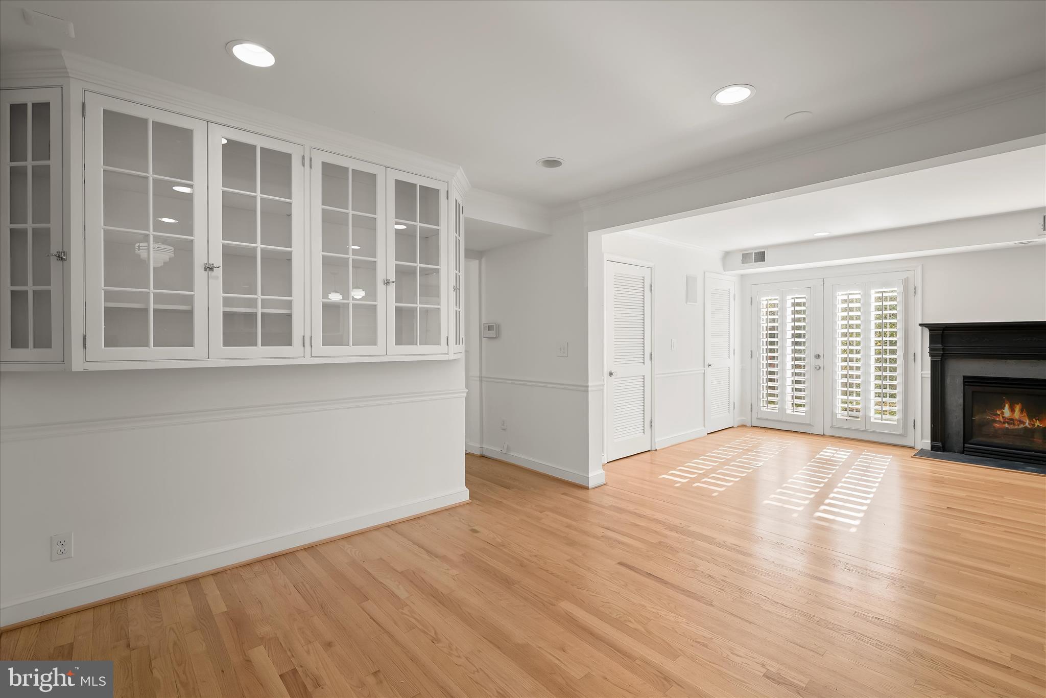 7012 Exeter Road Bethesda, MD 20814 - Photo 40 of 103 a view of an empty room with wooden floor and a window