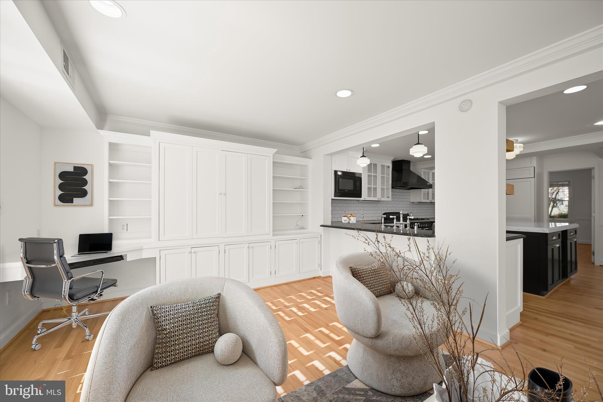 7012 Exeter Road Bethesda, MD 20814 - Photo 42 of 103 a living room with furniture and a flat screen tv