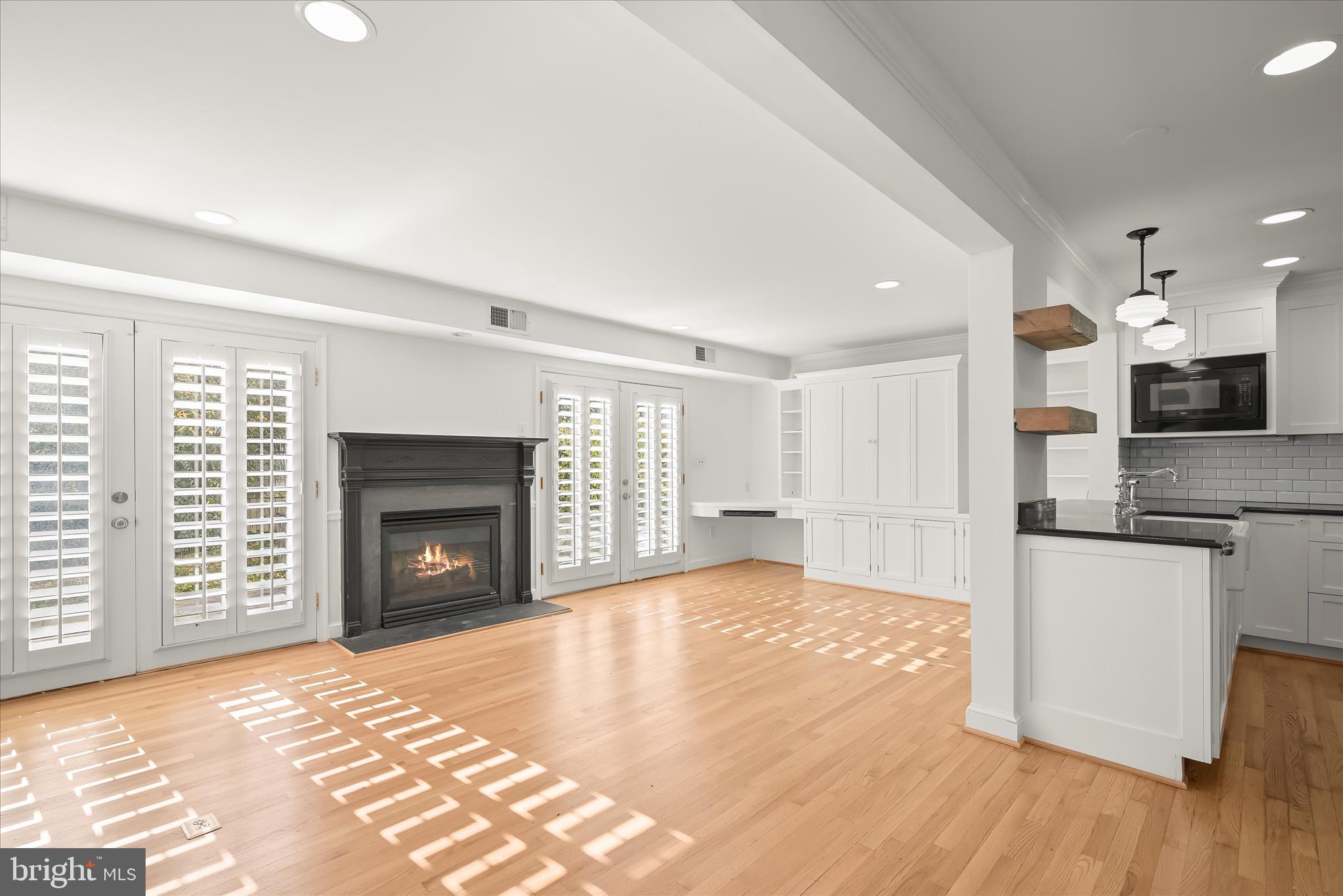 7012 Exeter Road Bethesda, MD 20814 - Photo 45 of 103 Fireplace sided by Atrium Doors