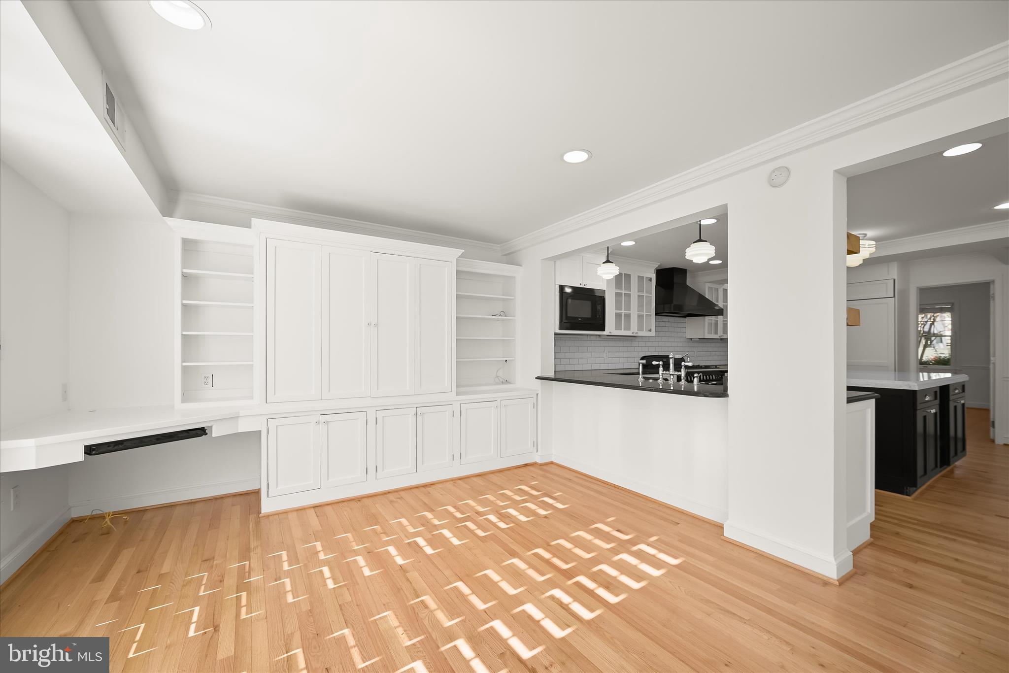 7012 Exeter Road Bethesda, MD 20814 - Photo 48 of 103 a view of a kitchen with wooden floor and a kitchen