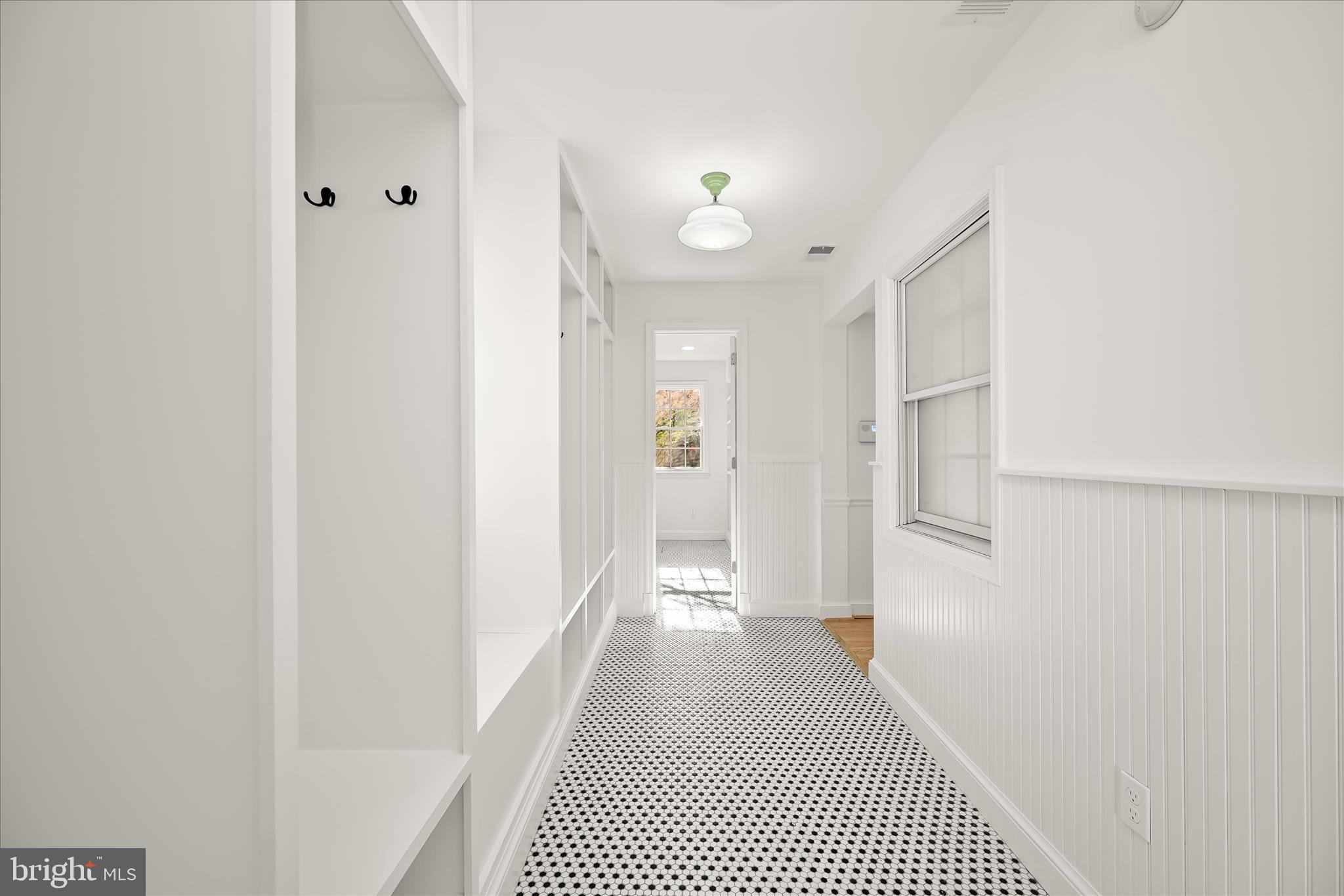7012 Exeter Road Bethesda, MD 20814 - Photo 57 of 103 a bathroom with a sink and a shower