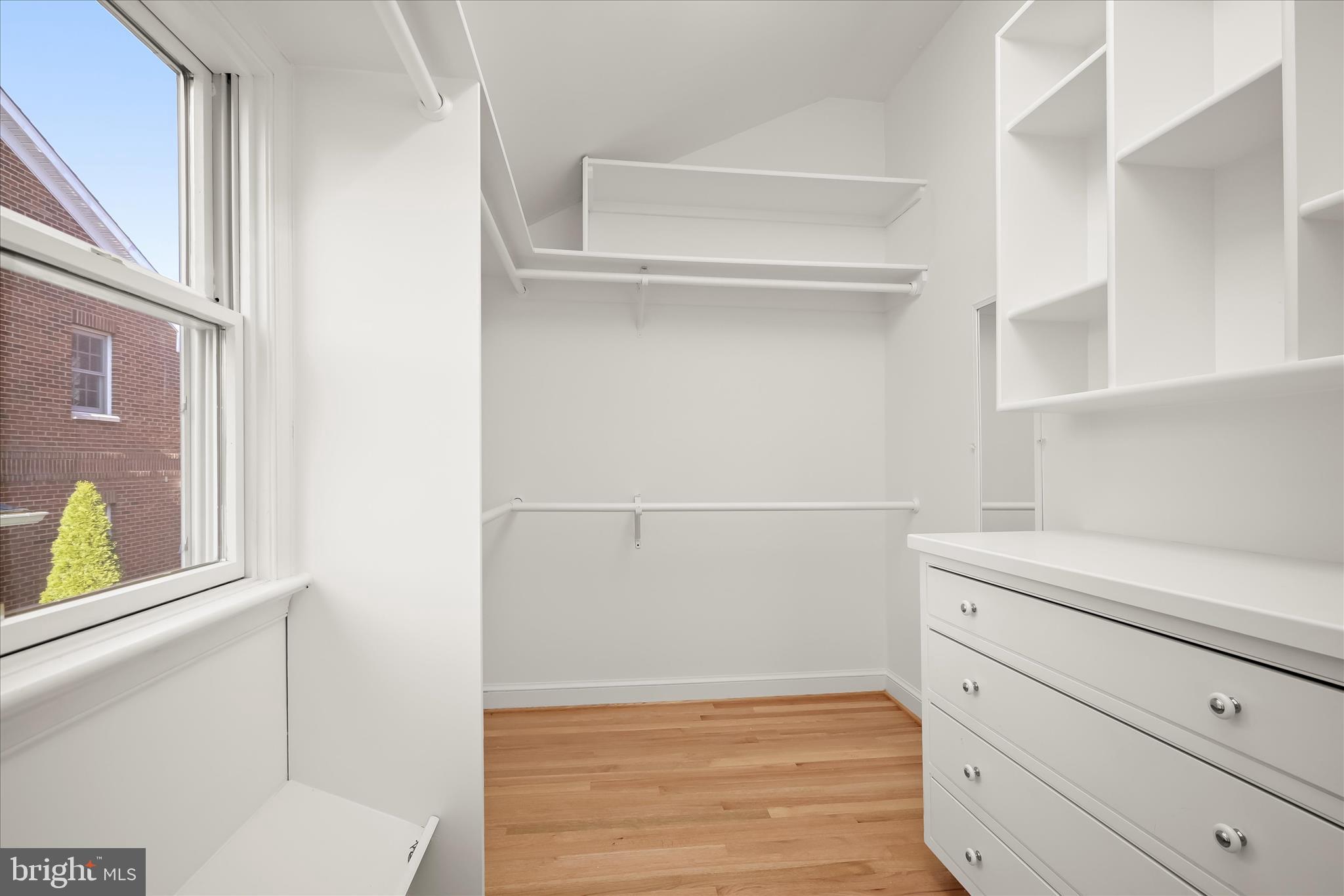 7012 Exeter Road Bethesda, MD 20814 - Photo 68 of 103 a view of a closet with wooden floor