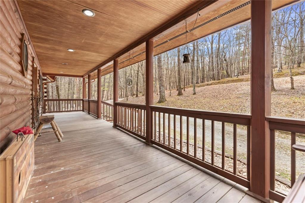 189 Frost Pine Circle Jasper, GA 30143 - Photo 2 of 42 a view of a porch with wooden floor and outdoor space