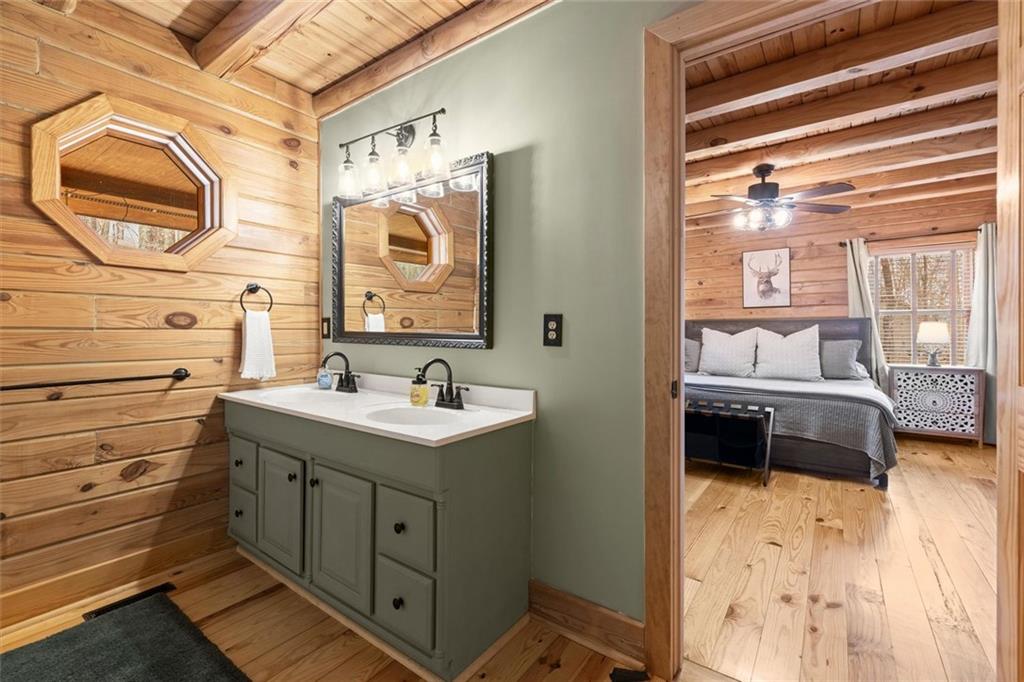 189 Frost Pine Circle Jasper, GA 30143 - Photo 24 of 42 a bathroom with a sink and a mirror