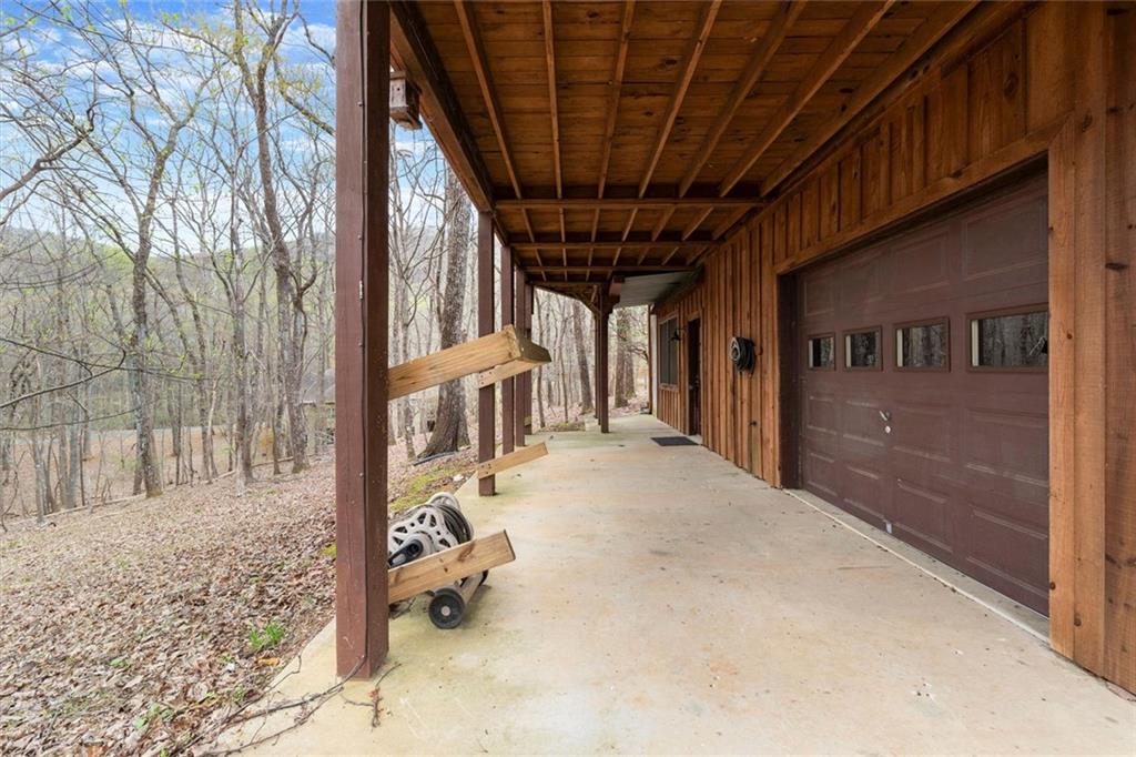 189 Frost Pine Circle Jasper, GA 30143 - Photo 10 of 42 a view of a porch with a backyard