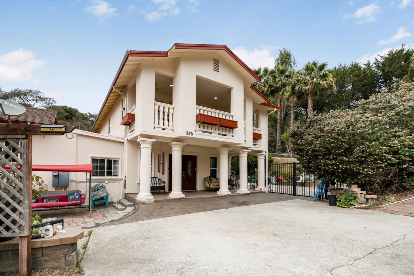 18171 Berta Canyon Road Salinas, CA 93907 - Photo 1 of 44 a front view of a building with a garden