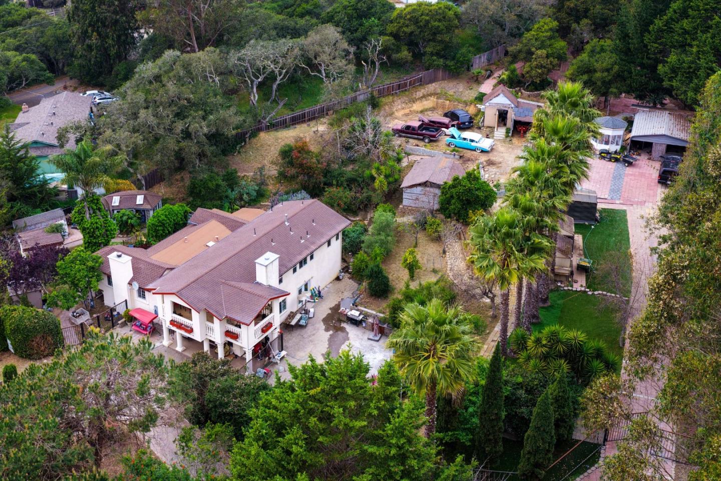 18171 Berta Canyon Road Salinas, CA 93907 - Photo 3 of 44 an aerial view of house with swimming pool outdoor seating and yard