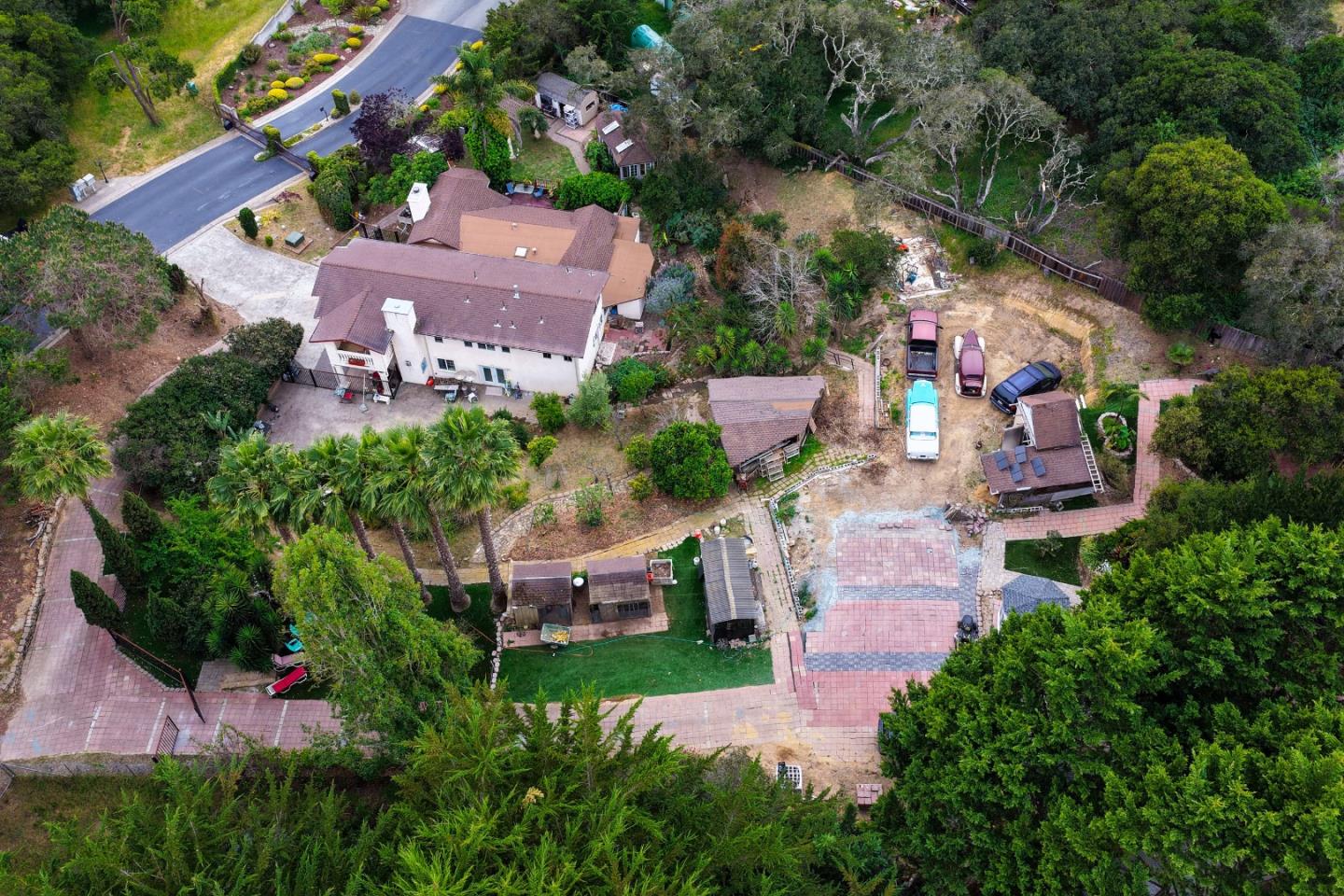 18171 Berta Canyon Road Salinas, CA 93907 - Photo 4 of 44 an aerial view of a house with a garden