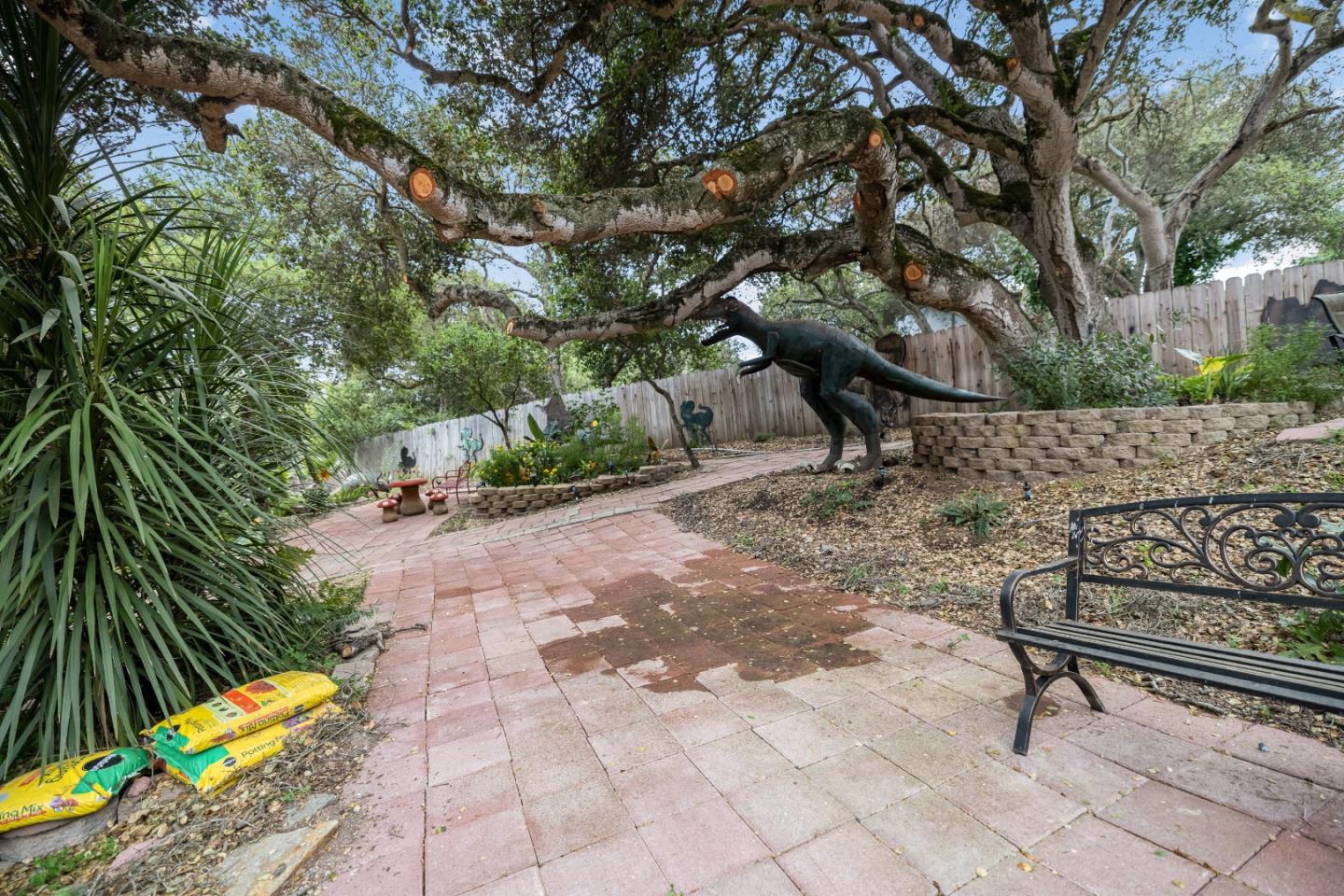 18171 Berta Canyon Road Salinas, CA 93907 - Photo 41 of 44 a bench sitting in the middle of a yard