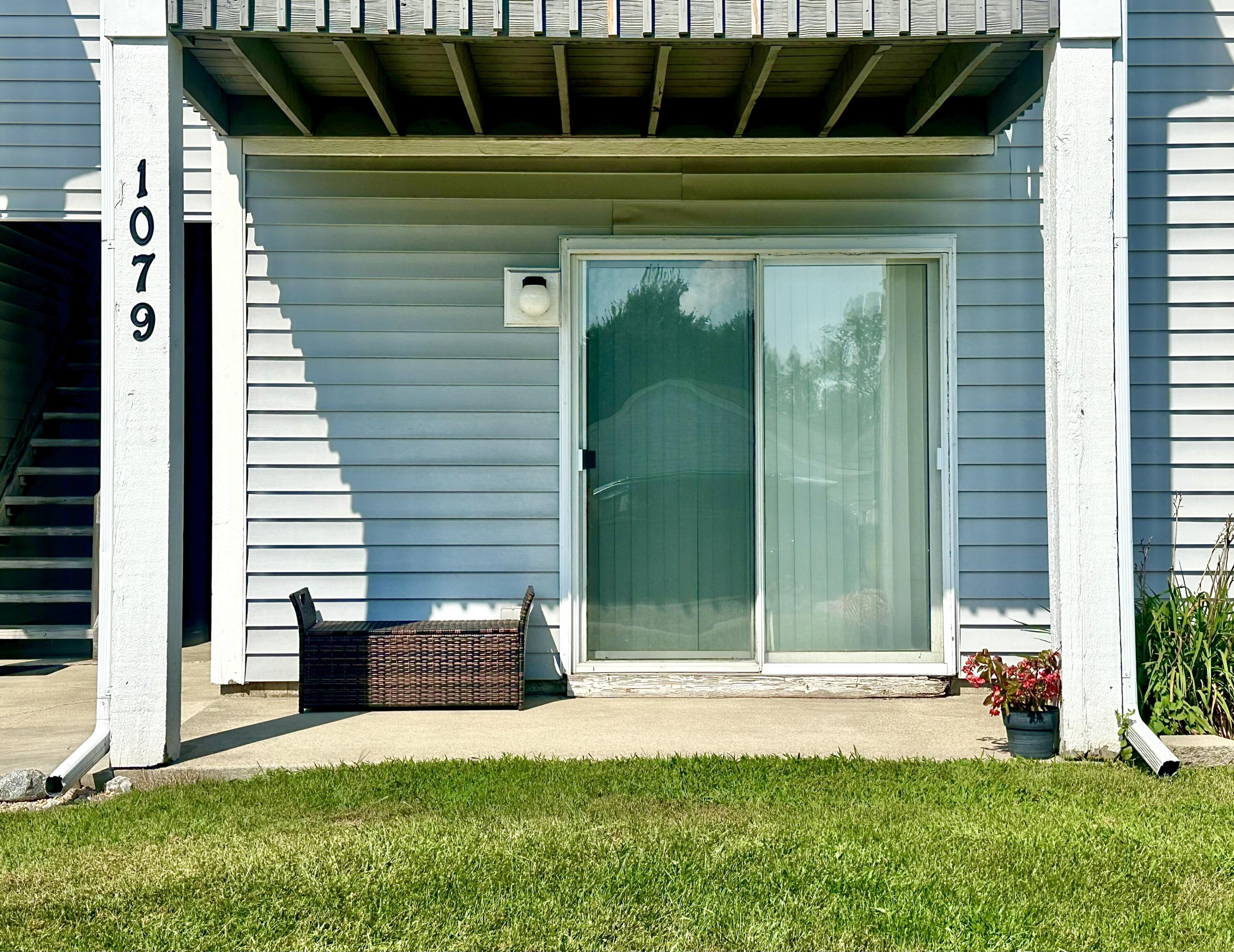 1079 Millpond Road, Unit A Valparaiso, IN 46385 - Photo 2 of 14 a view of backyard with a tub