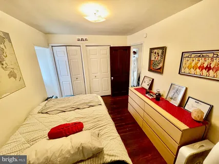 a bed room with a bed and a couch