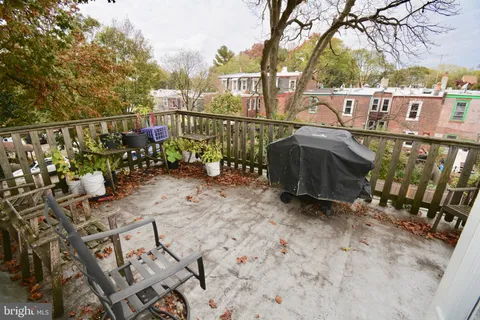 a view of a street with sitting area