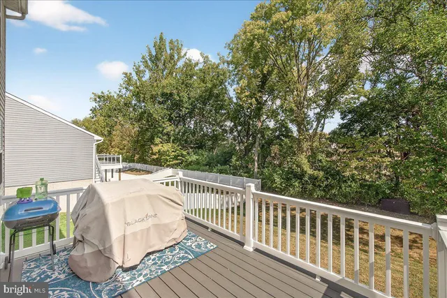 a view of a two chairs in the deck