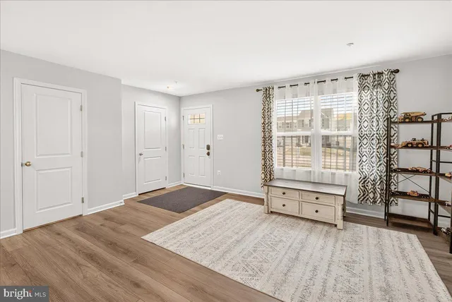 a view of a bedroom with furniture and empty room