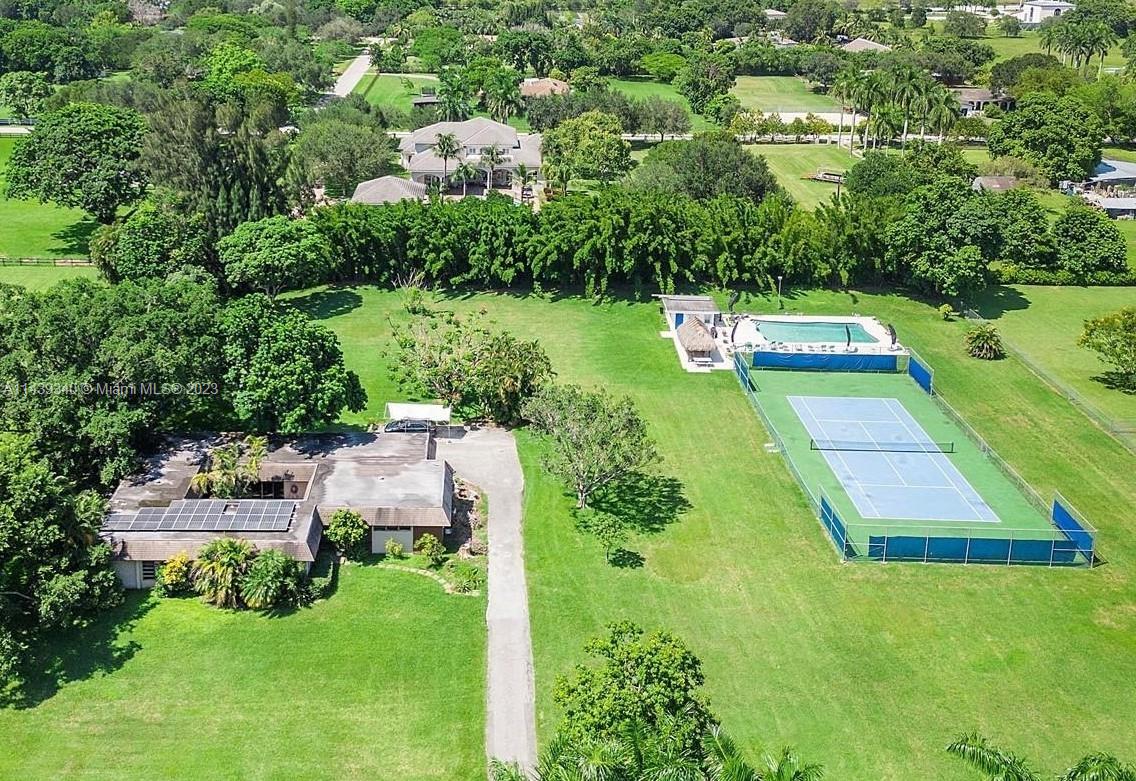 18201 Spring Road Southwest Ranches, FL 33331 - Photo 3 of 29 an aerial view of a house