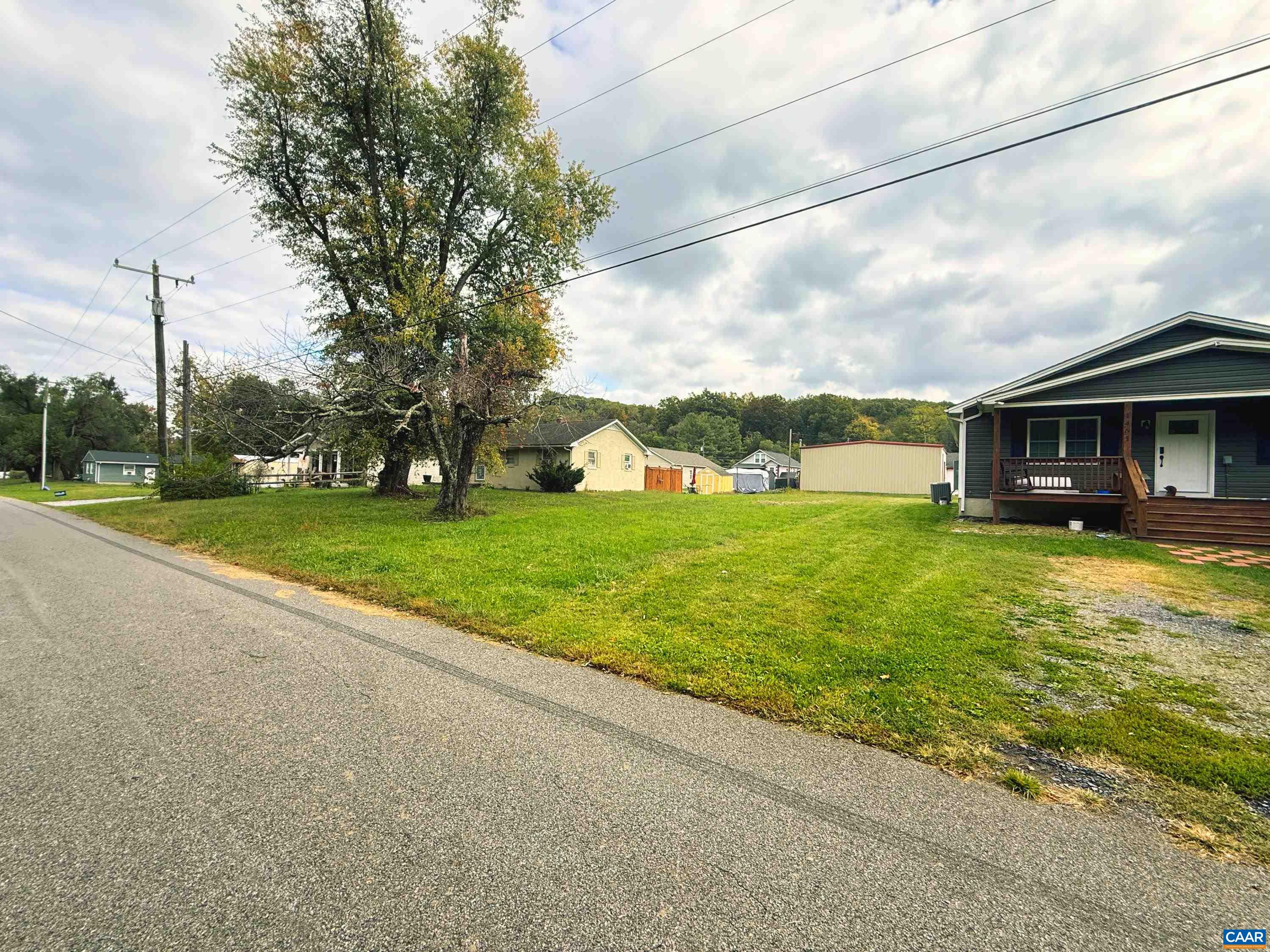 Tbd 10th Street Waynesboro, VA 22980 - Photo 8 of 10 a view of a house with a big yard potted plants and large tree