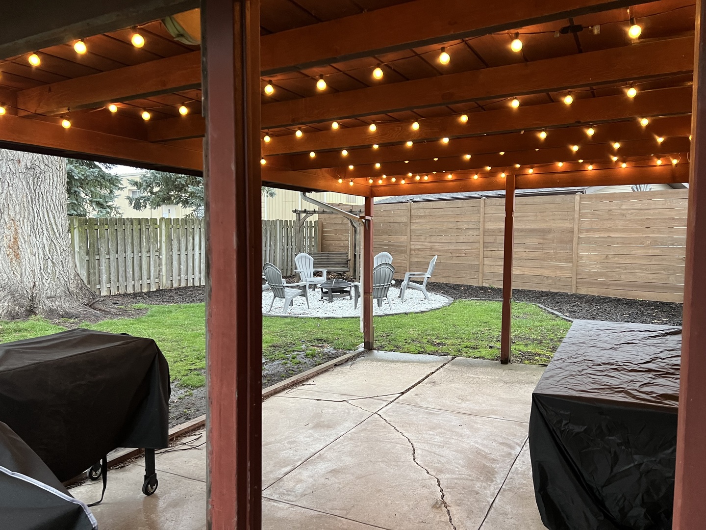 1114 North Main Street Rochelle, IL 61068 - Photo 19 of 21 a view of a porch with furniture and garden