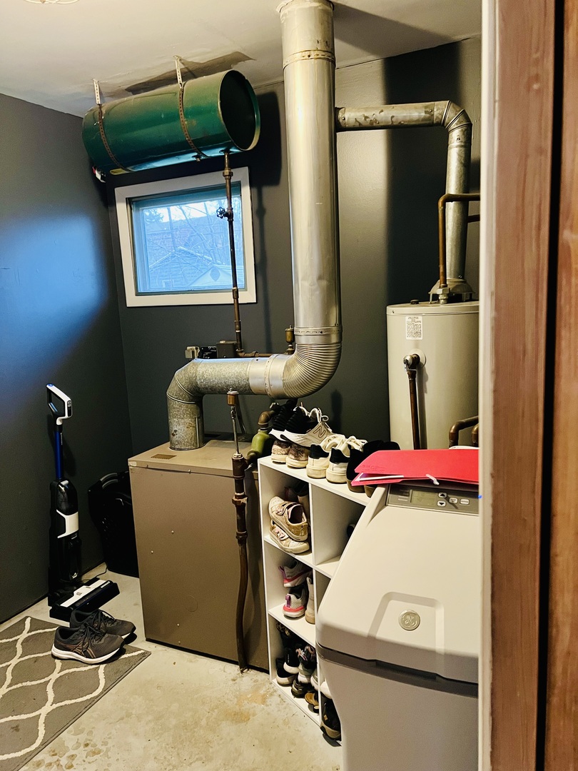 1114 North Main Street Rochelle, IL 61068 - Photo 20 of 21 a room with storage and utility