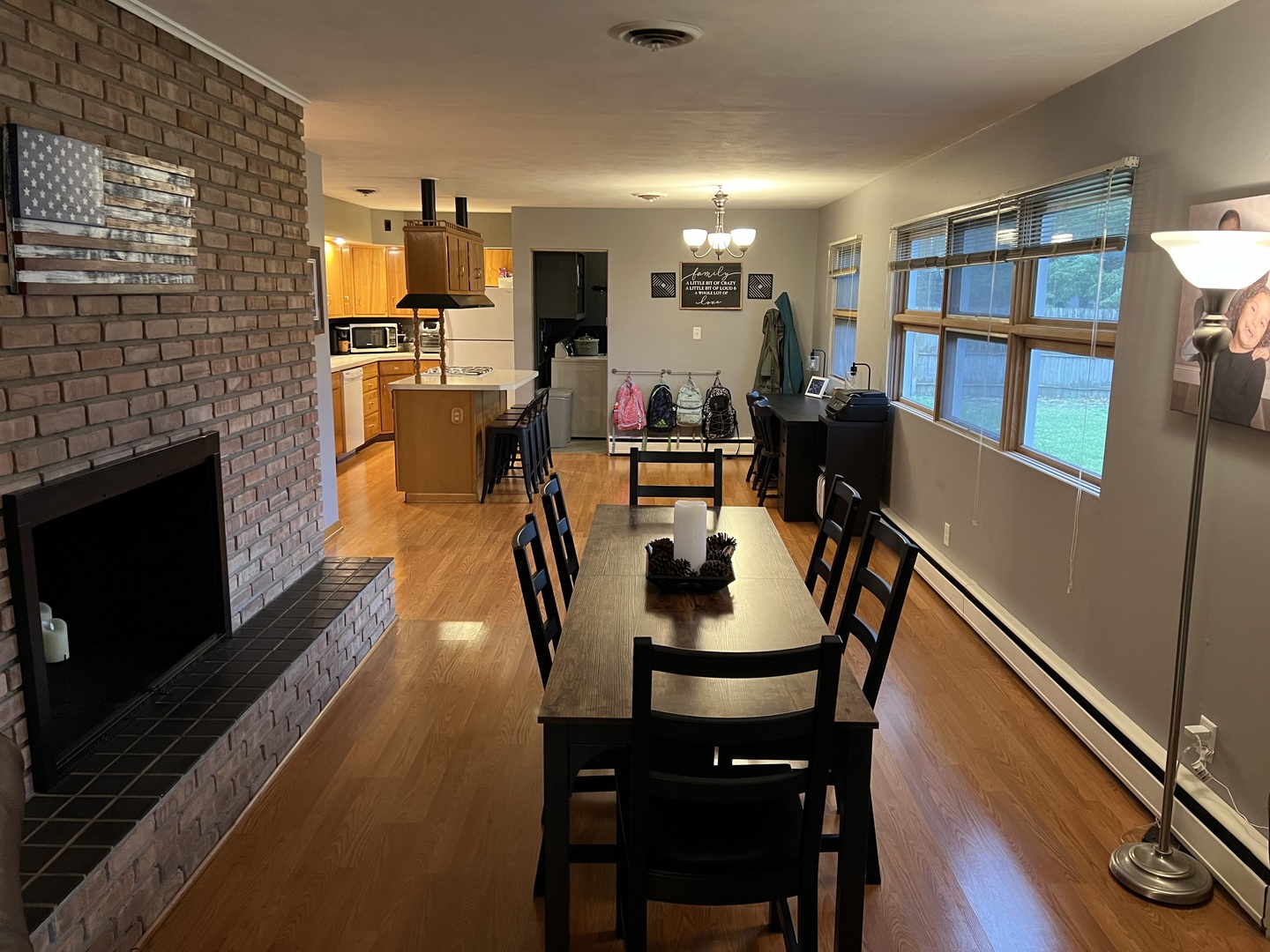 1114 North Main Street Rochelle, IL 61068 - Photo 7 of 21 a dining room with furniture and wooden floor