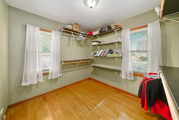 a bed room with a bed and a walk in closet