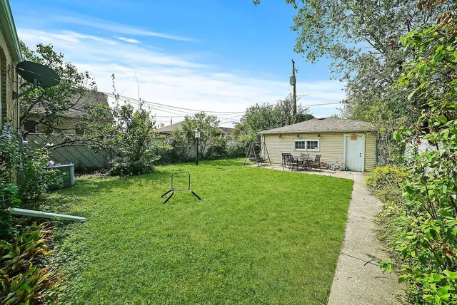 a house view with a garden space