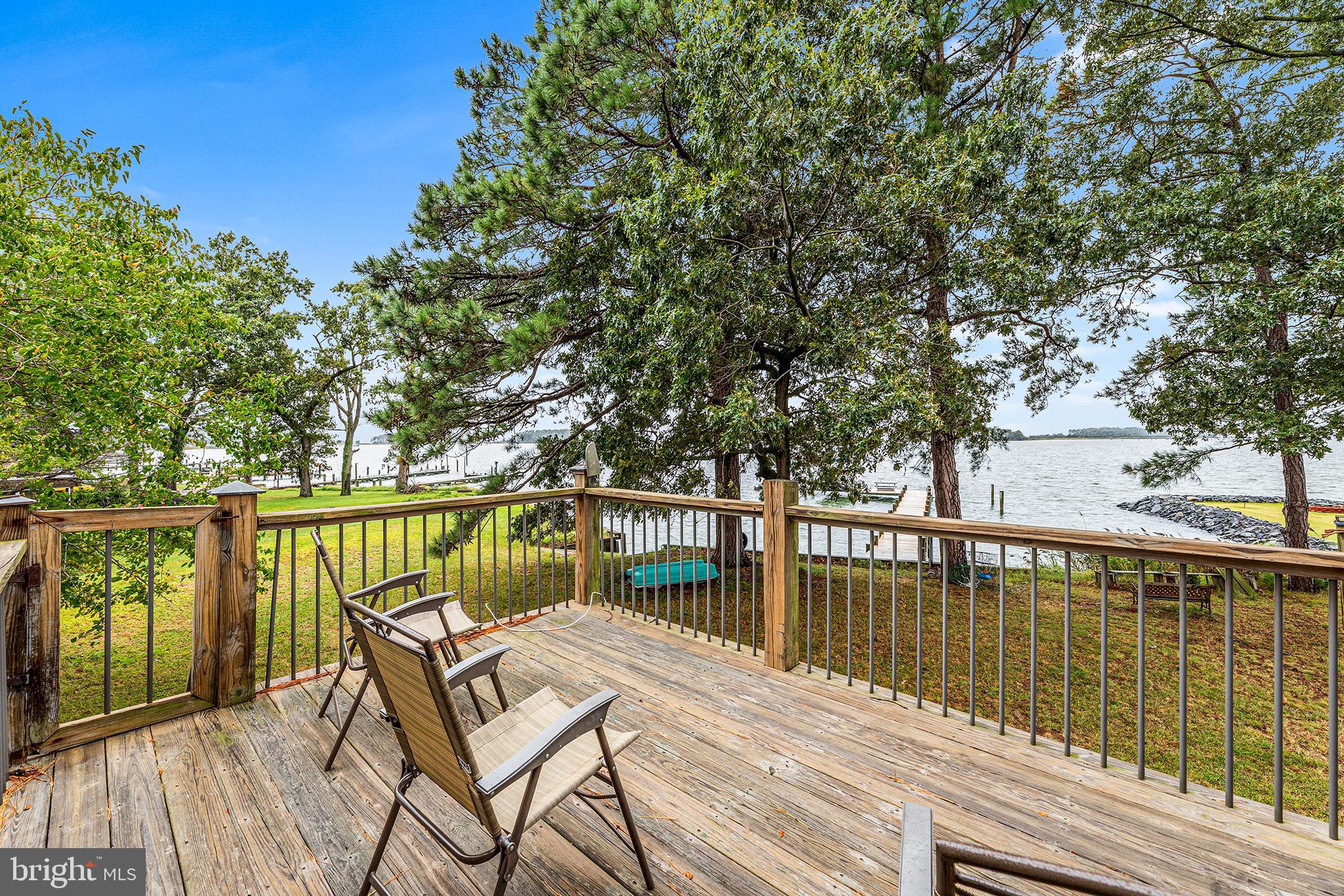 6138 Twin Point Cove Road Cambridge, MD 21613 - Photo 26 of 37 Private deck with steps leading to the yard
