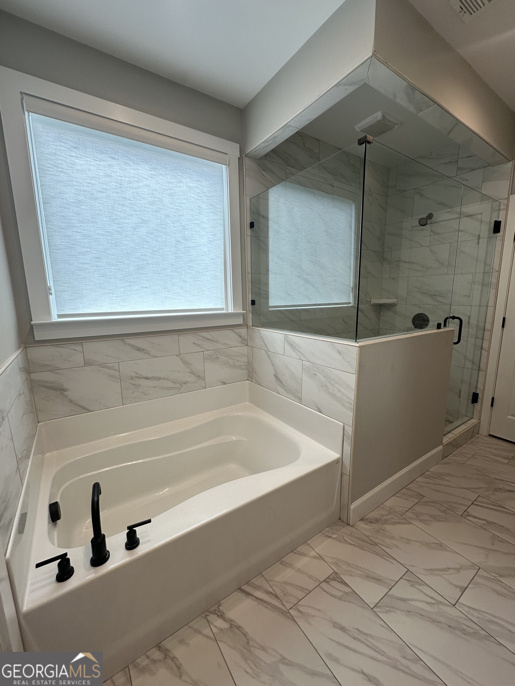 506 Summit View Drive Jefferson, GA 30549 - Photo 15 of 52 a bathroom with a bathtub and shower