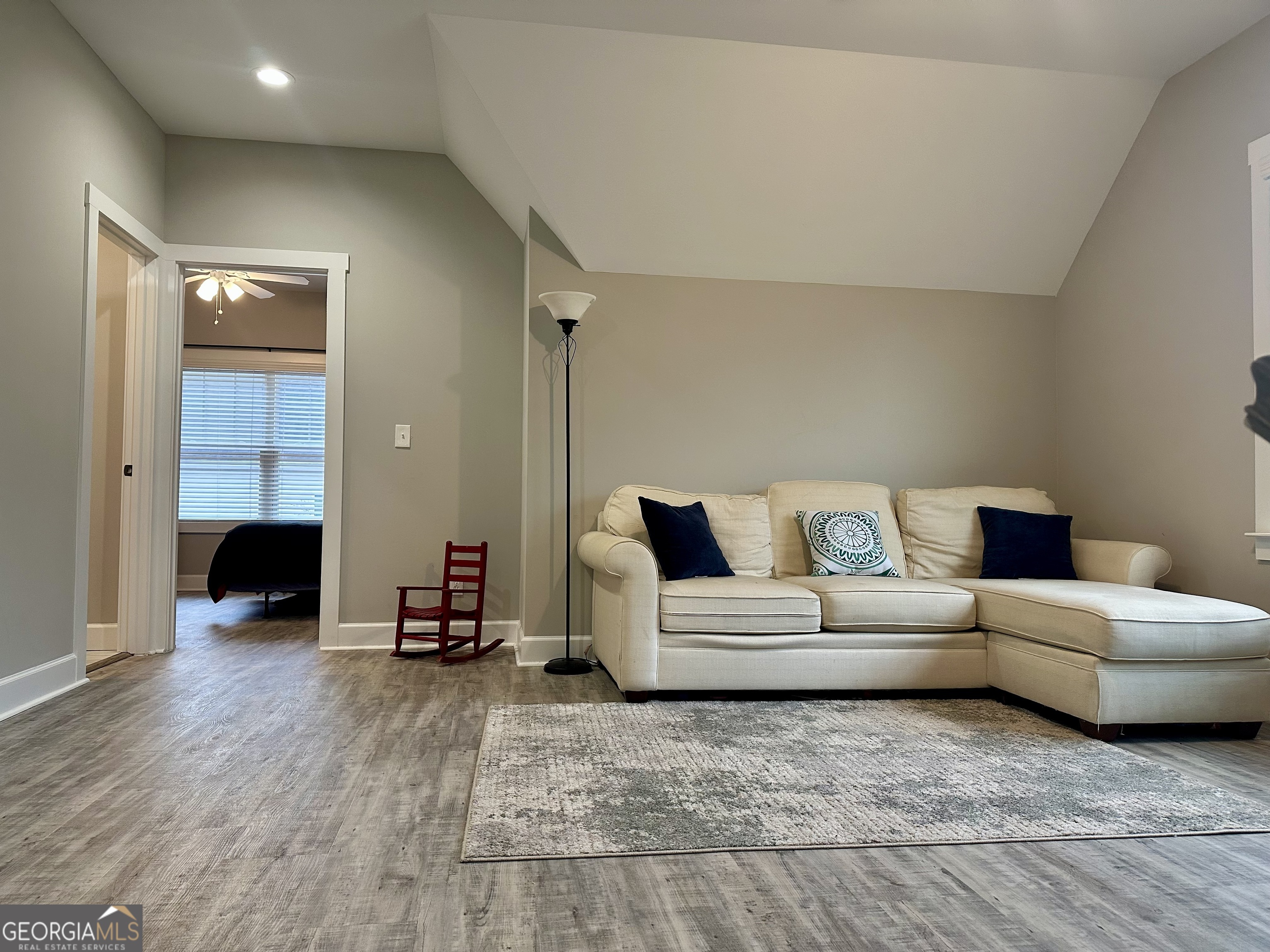 506 Summit View Drive Jefferson, GA 30549 - Photo 34 of 52 a living room with furniture and a wooden floor